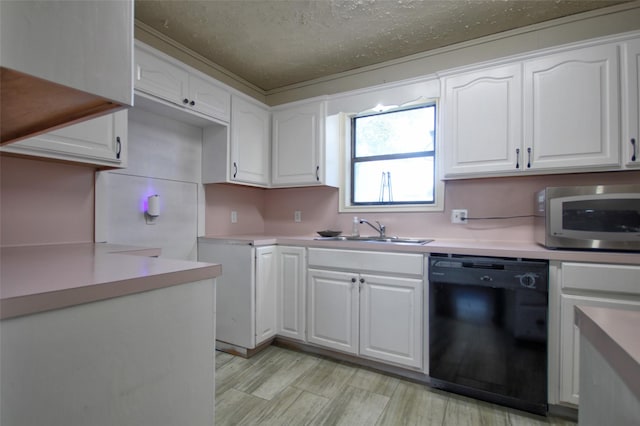 kitchen featuring black dishwasher, sink, a textured ceiling, and white cabinets