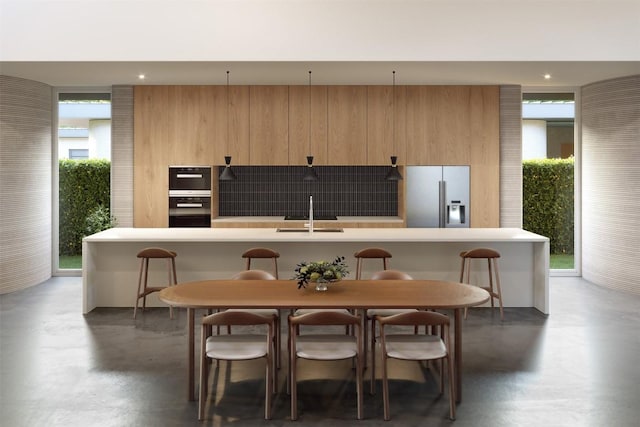 28 Peace Pipe, Wimberley, TX 78676 - dining space with concrete floors and recessed lighting