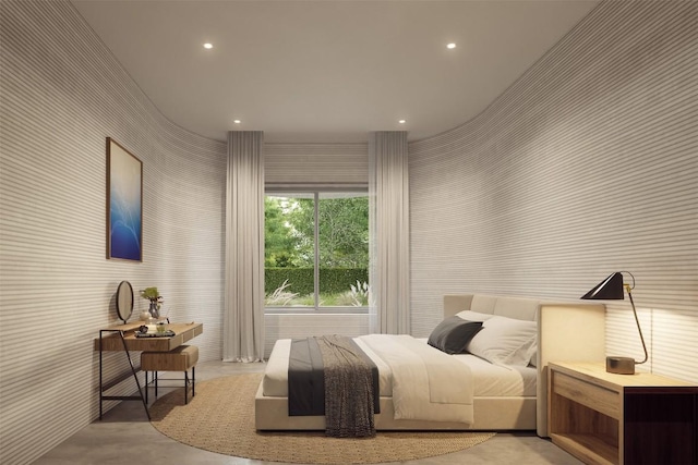 28 Peace Pipe, Wimberley, TX 78676 - bedroom featuring wallpapered walls, concrete flooring, and recessed lighting