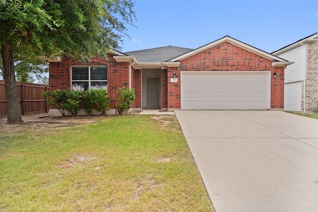 single story home with a garage and a front yard