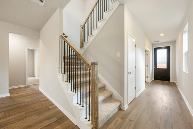 entryway with light hardwood / wood-style flooring