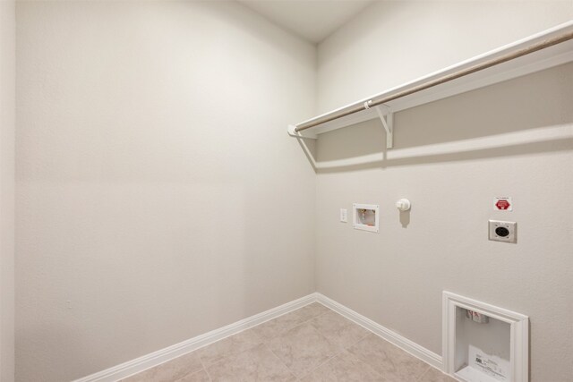 laundry area featuring washer hookup, light tile patterned flooring, hookup for a gas dryer, and hookup for an electric dryer