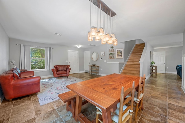 dining area with a chandelier