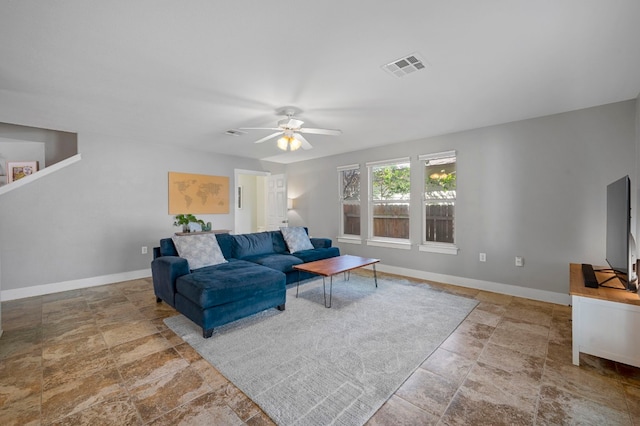 living room featuring ceiling fan