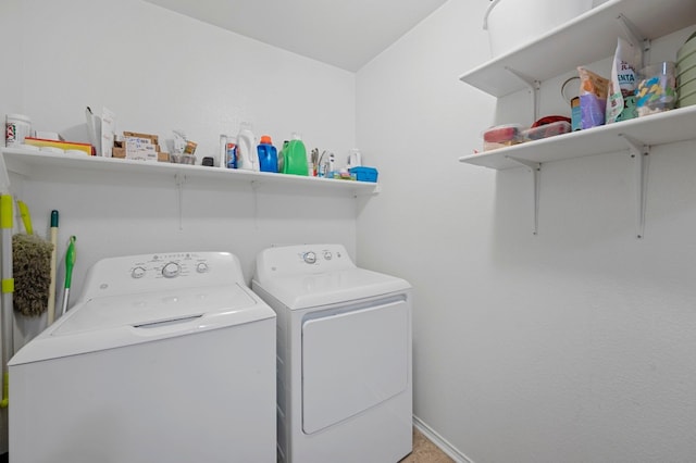 washroom with washing machine and dryer