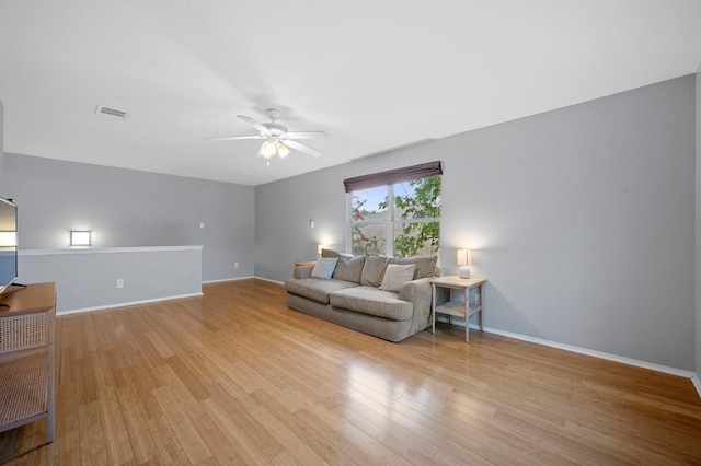 unfurnished living room with light hardwood / wood-style floors and ceiling fan