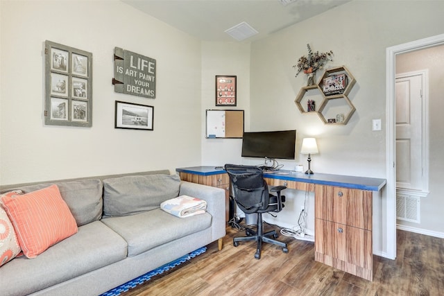 office area with wood-type flooring