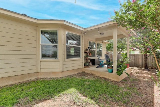 back of property with a patio area