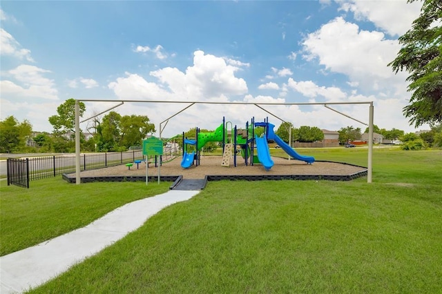 view of jungle gym with a lawn