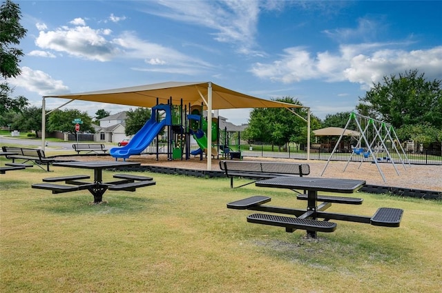 view of playground featuring a lawn