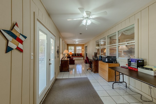 tiled home office with ceiling fan