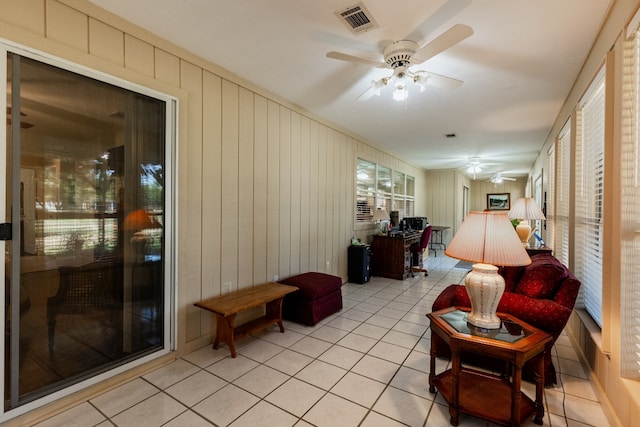 interior space with ceiling fan and a healthy amount of sunlight