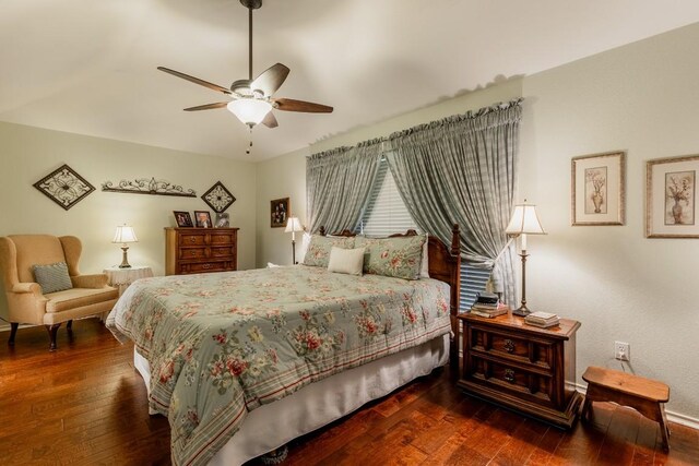 bedroom featuring dark hardwood / wood-style floors and ceiling fan