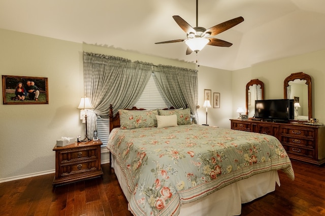 bedroom featuring dark hardwood / wood-style flooring and ceiling fan