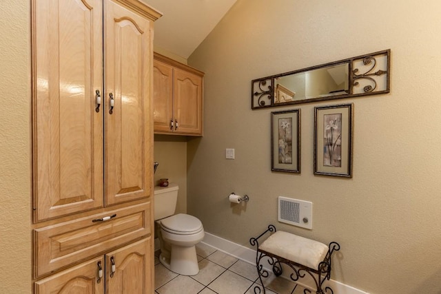 bathroom featuring tile patterned floors and toilet