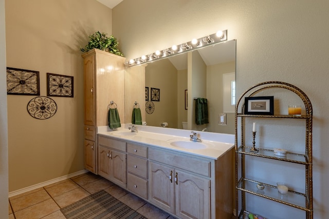 bathroom featuring dual vanity and tile patterned floors