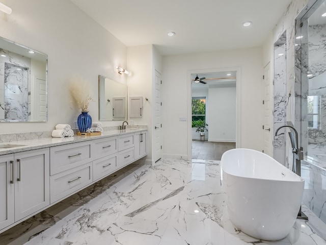 bathroom featuring ceiling fan, vanity, and independent shower and bath