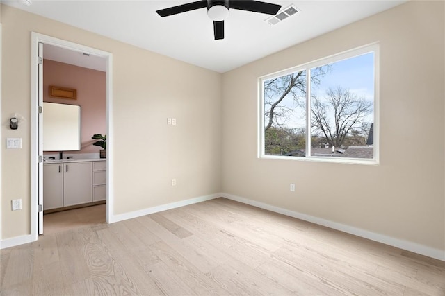 unfurnished bedroom featuring ceiling fan and light wood-type flooring