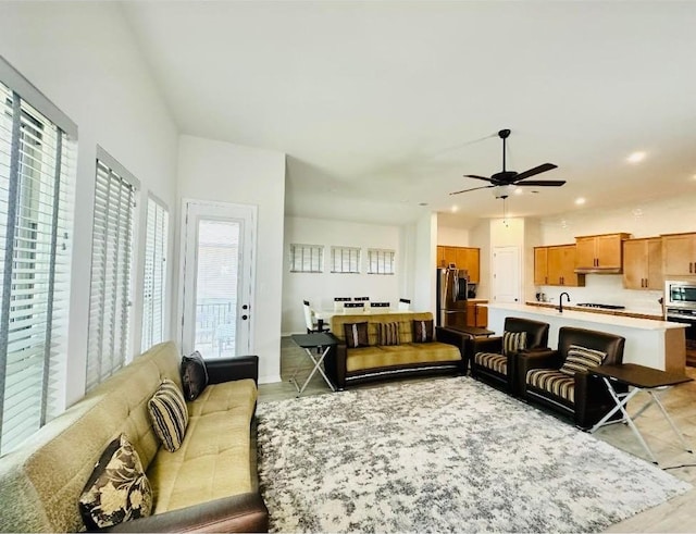 living room with ceiling fan