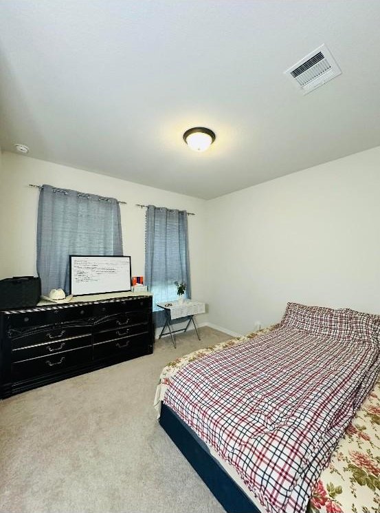 bedroom featuring carpet floors