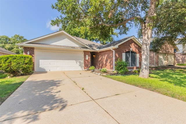 single story home with a garage and a front yard