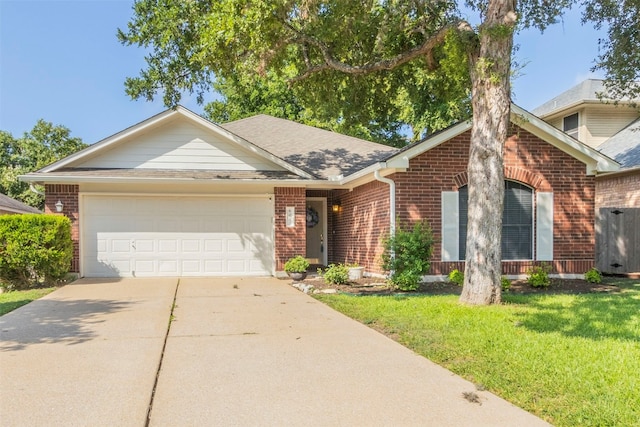 ranch-style home featuring a garage and a front lawn