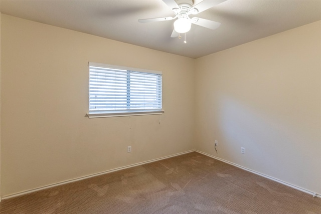 unfurnished room with carpet floors and ceiling fan