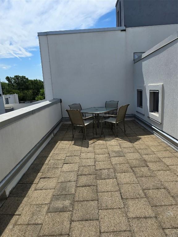 view of patio / terrace featuring a balcony