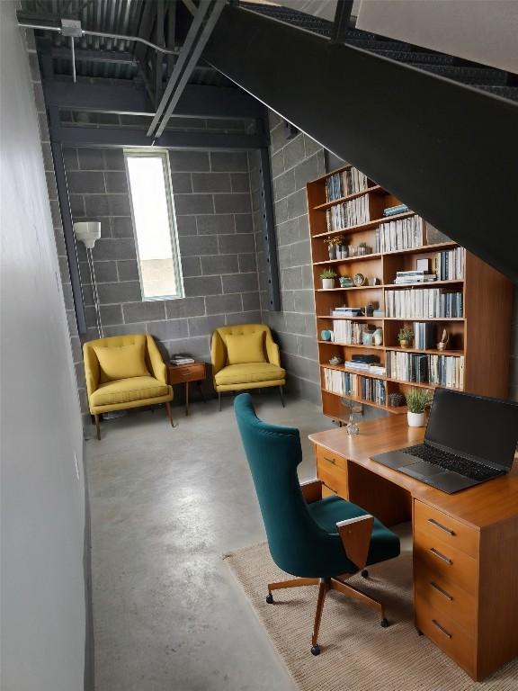 office with concrete flooring