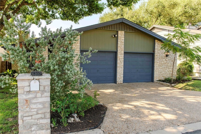 view of front of house featuring an outbuilding and a garage