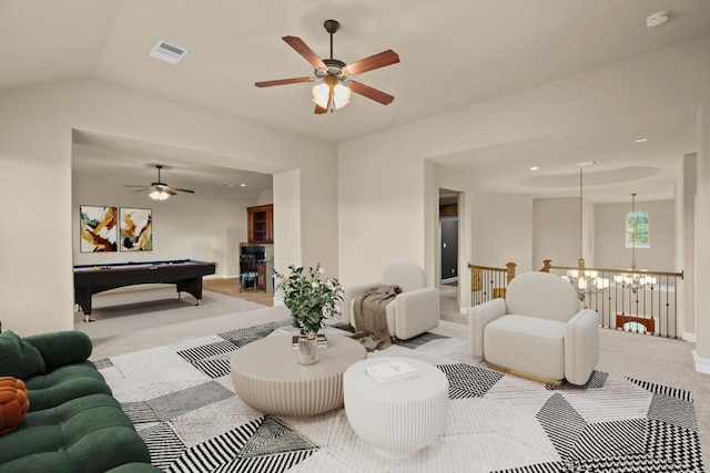 living area featuring pool table, light carpet, ceiling fan with notable chandelier, visible vents, and lofted ceiling