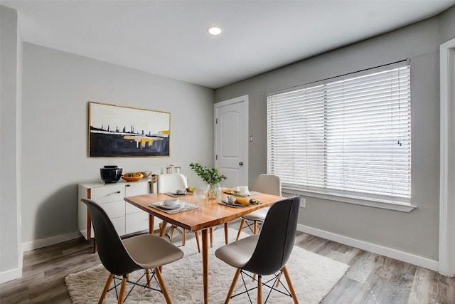 dining room featuring light hardwood / wood-style floors