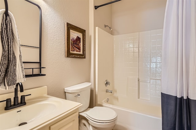 full bathroom featuring toilet, vanity, and shower / tub combo