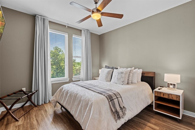 bedroom featuring ceiling fan and hardwood / wood-style floors