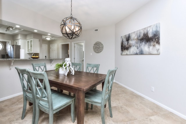 dining area with a chandelier