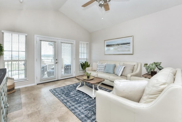 living room featuring high vaulted ceiling, ceiling fan, and french doors