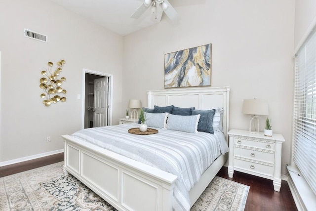 bedroom with dark wood-type flooring and ceiling fan