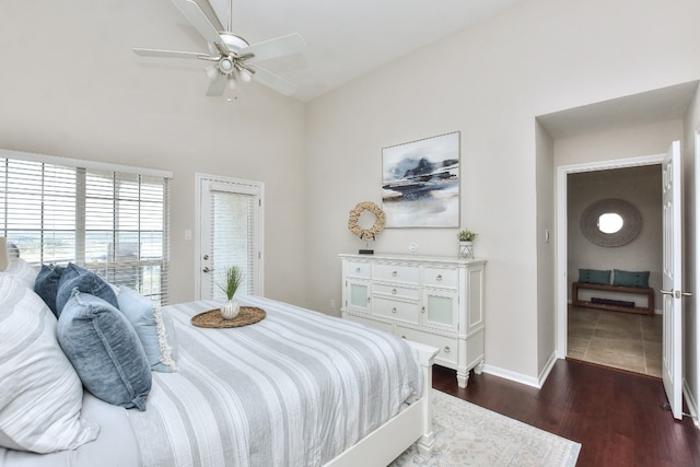 bedroom with ceiling fan and dark hardwood / wood-style floors