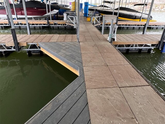 view of dock with a water view