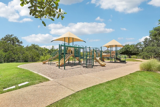 view of playground with a yard