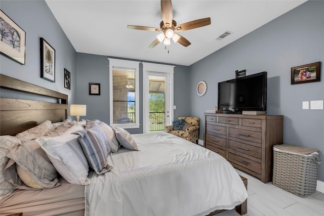 bedroom featuring access to exterior and ceiling fan