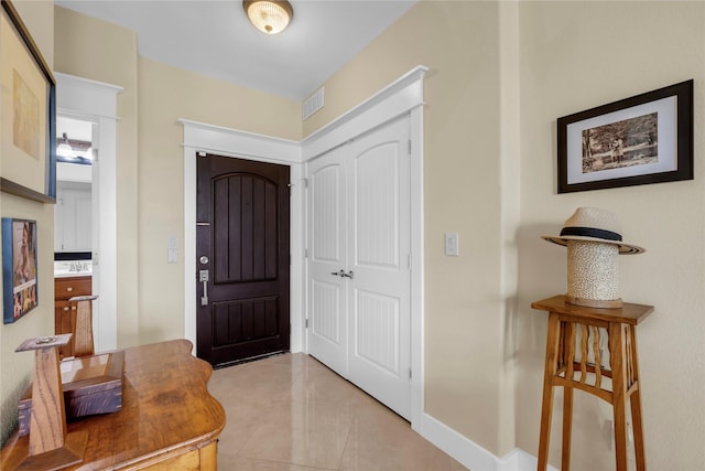 view of tiled entrance foyer