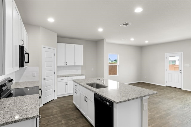 kitchen with sink, white cabinets, an island with sink, and dishwasher