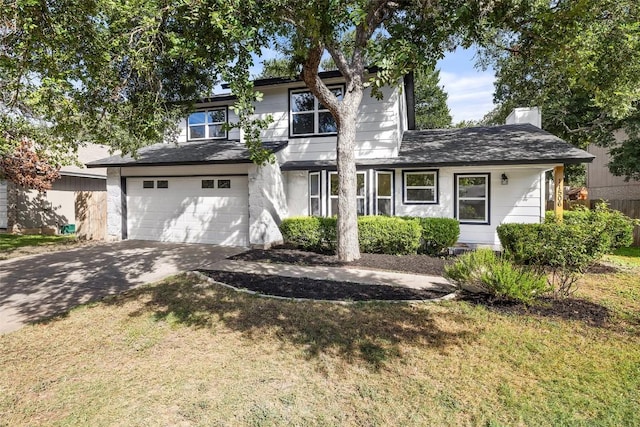 11506 Fence Post Trl, Austin, TX 78750 - view of front of home with driveway, an attached garage, a front yard, and roof with shingles