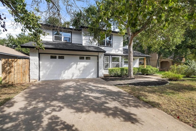 11506 Fence Post Trl, Austin, TX 78750 - traditional home featuring driveway, a garage, and a shingled roof