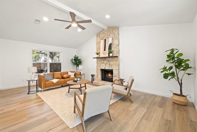 11506 Fence Post Trl, Austin, TX 78750 - living room with light wood finished floors, a fireplace, ceiling fan, and baseboards