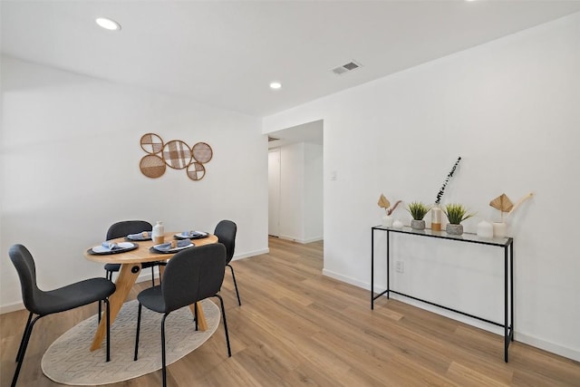 11506 Fence Post Trl, Austin, TX 78750 - dining space with light wood-type flooring, baseboards, and recessed lighting