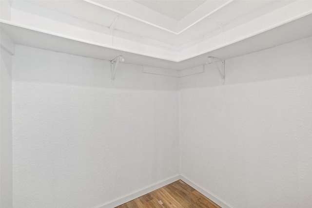 11506 Fence Post Trl, Austin, TX 78750 - walk in closet featuring wood finished floors