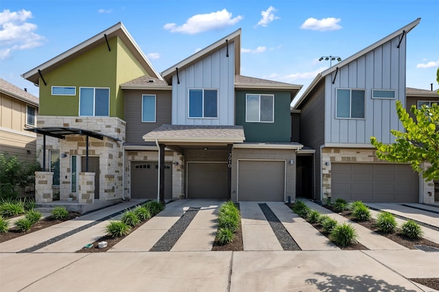 multi unit property featuring a garage