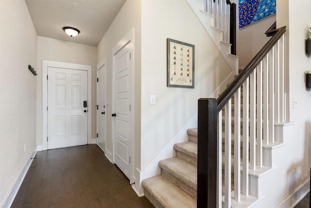 foyer featuring dark hardwood / wood-style floors